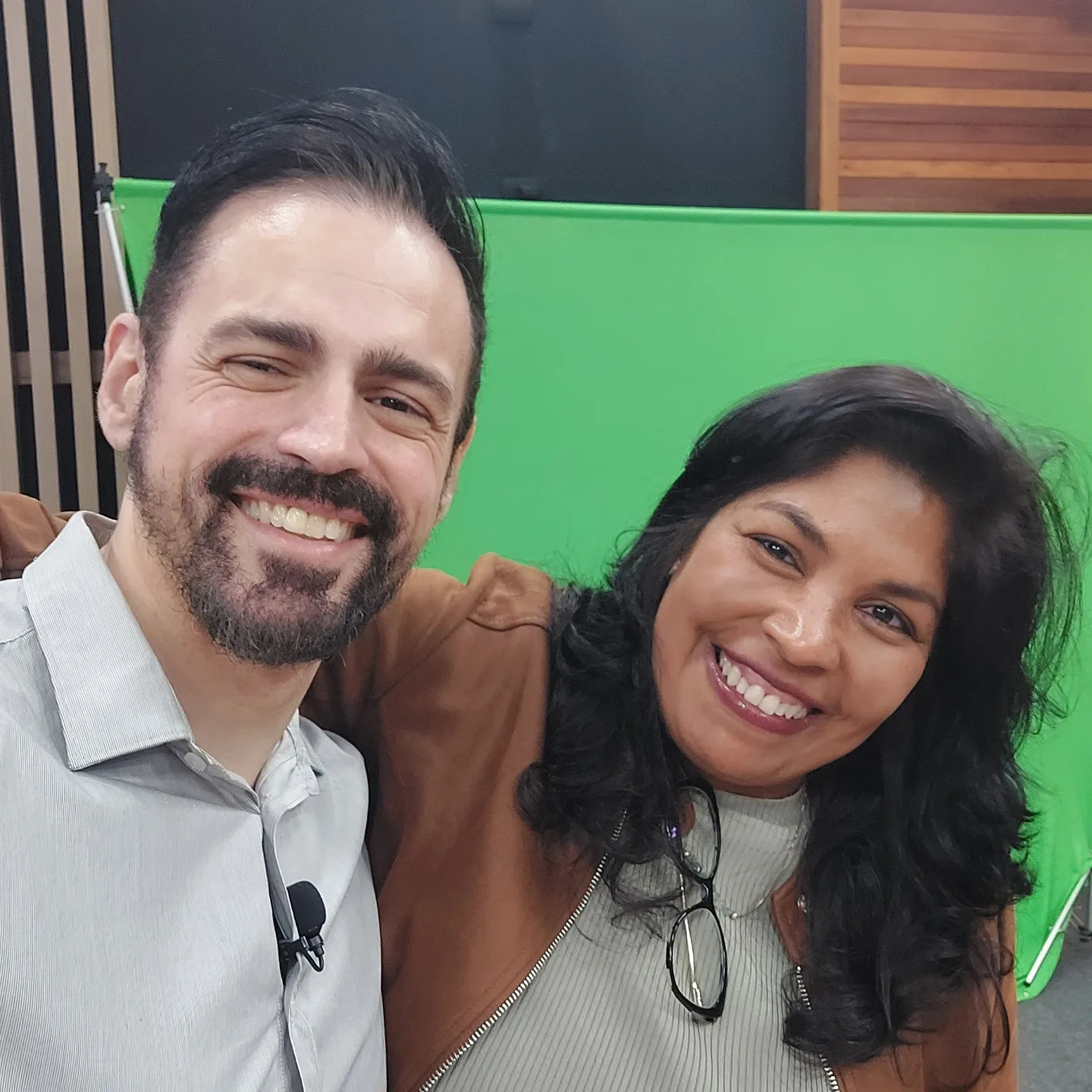 Teachers Ed Gomes Jr. and Ivanete Landim smile and pose