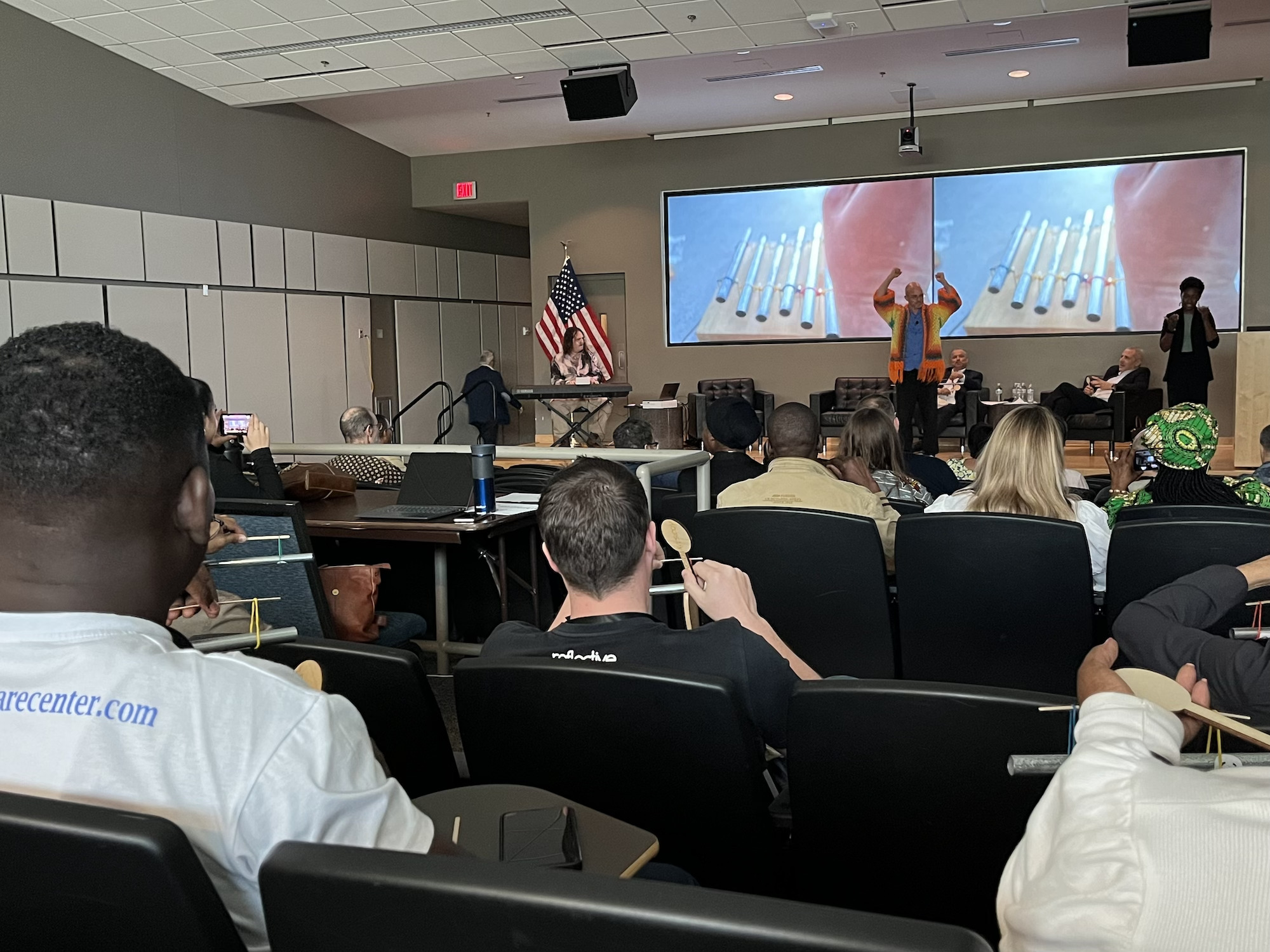 Victor Minces of the University of California, San Diego, leads symposium participants to create music using everyday materials. 