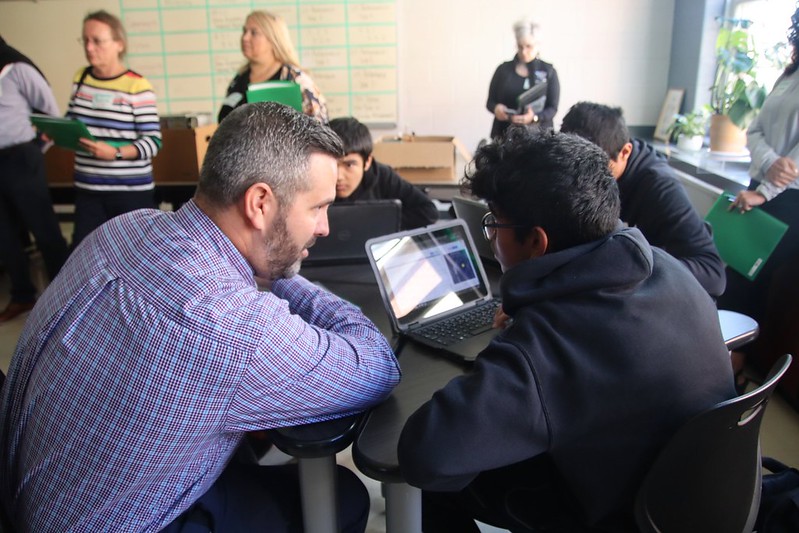 Students engaged in discussions about CMU CS Academy’s graphics-based computer science curriculum which allows students to be creative while learning Python.