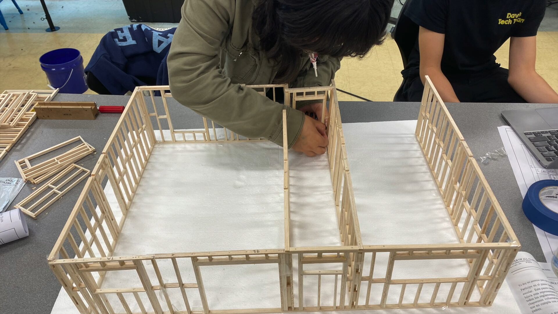 Students build their prototype for a sustainable house.